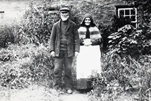 Couple outside cottage, Pembrokeshire, South Wales