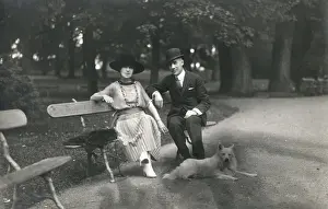 Pleats Prints: Couple in a park with a dog, France