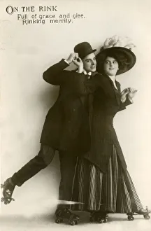 Skate Gallery: Couple roller skating in a studio portrait