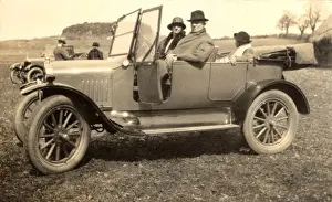 Automobilia Prints: A couple in a sports car