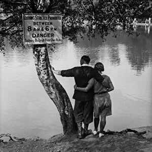 Ponds Collection: Couple standing by Keston Ponds, Kent