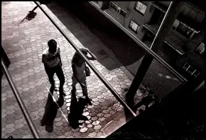 Couple walking at night, Spain
