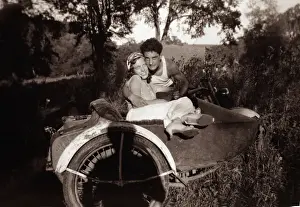 Harley Prints: Couple together with1948 Harley Davidson motorcycle sidecar