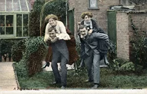 Images Dated 25th April 2019: Two Couples have a piggy-back race in the back garden