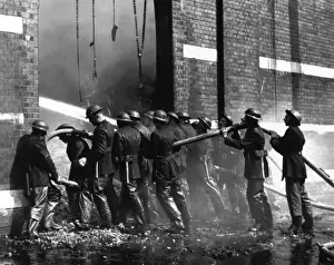 Waterproofs Prints: Crew of firefighters in action, WW2