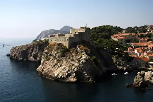 CROATIA. DUBROVNIK. Coastal scene with Fort Lovrjenac