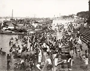 Crowd bathing in the Hooghly River, Calcutta, Kolkata