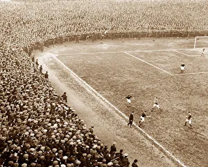 A crowd at a football match, early 1900s