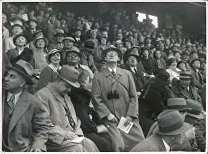 Binoculars Prints: CROWD AT A HORSE RACE