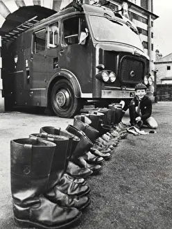 Foot Wear Prints: Cub Scout cleaning firemens boots, Surrey