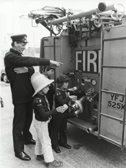 Polish Collection: Cub Scouts cleaning fire engine