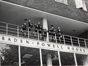 Cubs waving from Baden Powell House, London