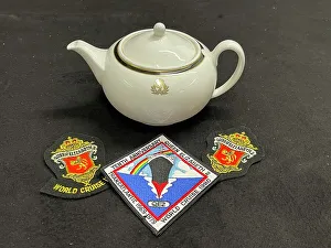 Cunard Line, QE2 Wedgwood teapot, embroidered badges