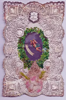 Affection Collection: Cupid with ivy leaves on a paper lace romantic card