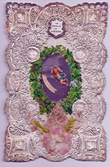 Affection Collection: Cupid with ivy leaves on a paper lace romantic card