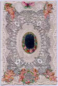 Images Dated 18th June 2018: Cupids and flowers on a romantic paper lace card