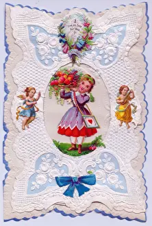 Cupids and girl on a paper lace romantic card