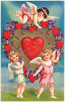 Cupids with hearts and flowers on a Valentine postcard