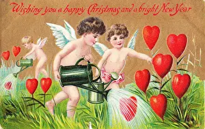 Cupids with red hearts on a Christmas and New Year postcard