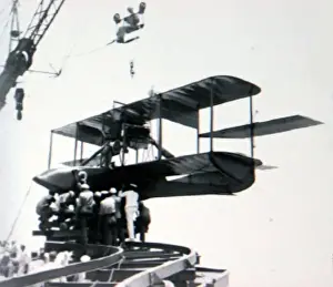 Usmc Prints: Curtiss AB-3 of the USMC being hoisted aboard USS North