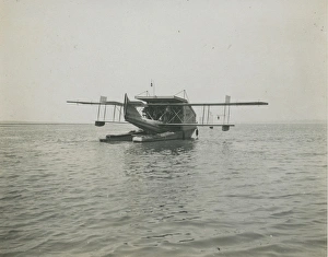 Adapted Gallery: A Curtiss H12 Large America in a towing lighter adapted ?