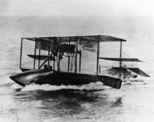 Amphibians Collection: Curtiss Model F Biplane Flying-Boat Moving in the Water