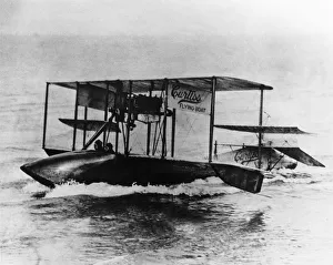 Amphibians Collection: Curtiss Model F Biplane Flying-Boat Moving in the Water