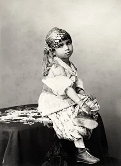 Photographers Prints: Cute child, photographers studio, probably India, late 19th