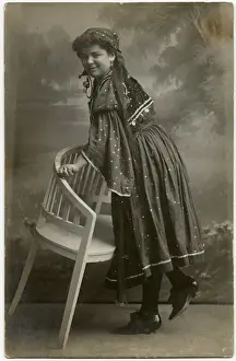 Czech Peasant girl in traditional costume - studio portrait