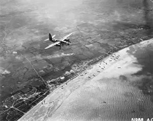 Martin Prints: D-Day - Bomber giving air support to infantry invasion