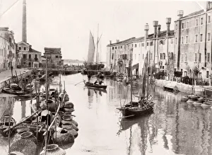 Daily life on a canal, boats, cargo, Venice Italy