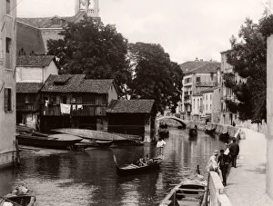 Daily life on a canal, boats, gondola, Venice Italy