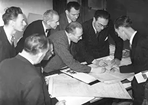 Farringdon Prints: Daily Worker staff examining building alteration plans