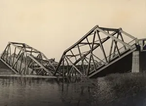 Infrastructure Prints: Damaged bridge on a river crossing