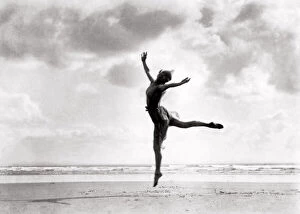 Leaping Gallery: Dancer on a beach - by Bertram Park, c.1930s