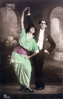 Images Dated 23rd January 2020: Two dancers pose for the camera with arms aloft... Date: 1914