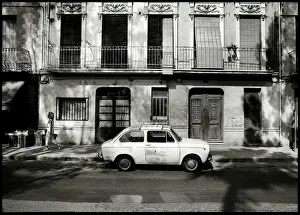 Dappled Prints: Dappled sunlight pedestrian and car, Valencia, Spain