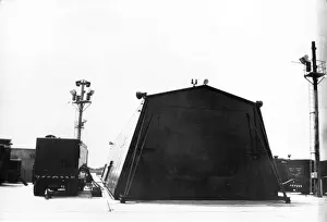 Thor Prints: Dark blue painted shed containing a Thor IRBM