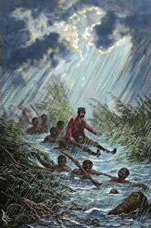 David Livingstone (1813-1873) through a swamp with a porter