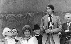 David Steel giving a speech, Michael Foot listening