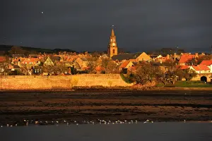 Northumberland Prints: Dawn rays of winter sun on town hall clock tower, Berwick