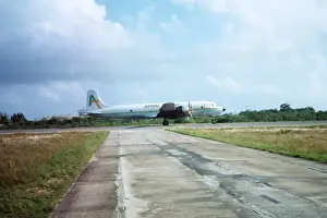 Freighter Prints: DC-6 at Belize