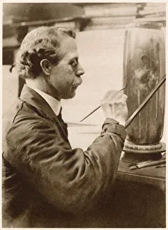 Images Dated 7th June 2021: Decoration of ware: an artist painting a vase. Date: 1913
