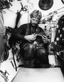 Gauge Prints: Deep sea diver in diving bell, off The Lizard, Cornwall