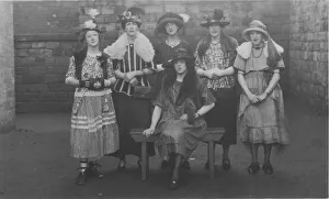 Six delightful young ladies - actually men dressed up as women Six delightful young ladies - actually men dressed up as women