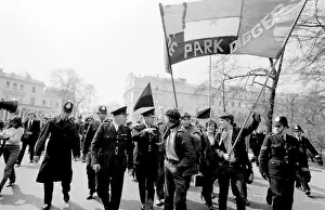 Demonstration in London -- young protesters walking along a road with a banner belonging