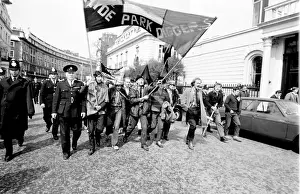 Demonstration in London -- young protesters walking along a road with a banner belonging