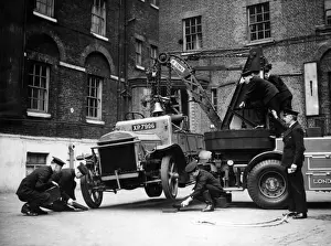 Suspended Prints: Dennis breakdown lorry, demonstrating wrong method