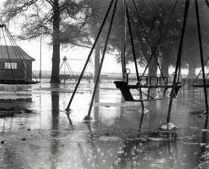 Deserted Prints: A deserted children's playground on a wet day