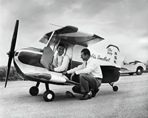 Images Dated 12th December 2017: Designer Ray Stits Kneeling by and Test-Pilot Bob ( Robe?